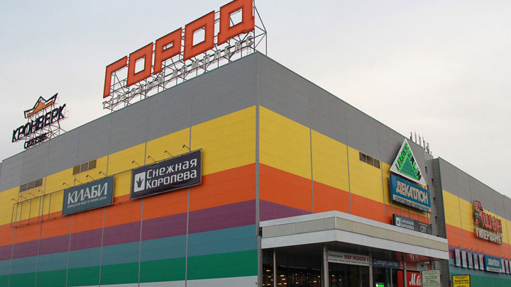 город
